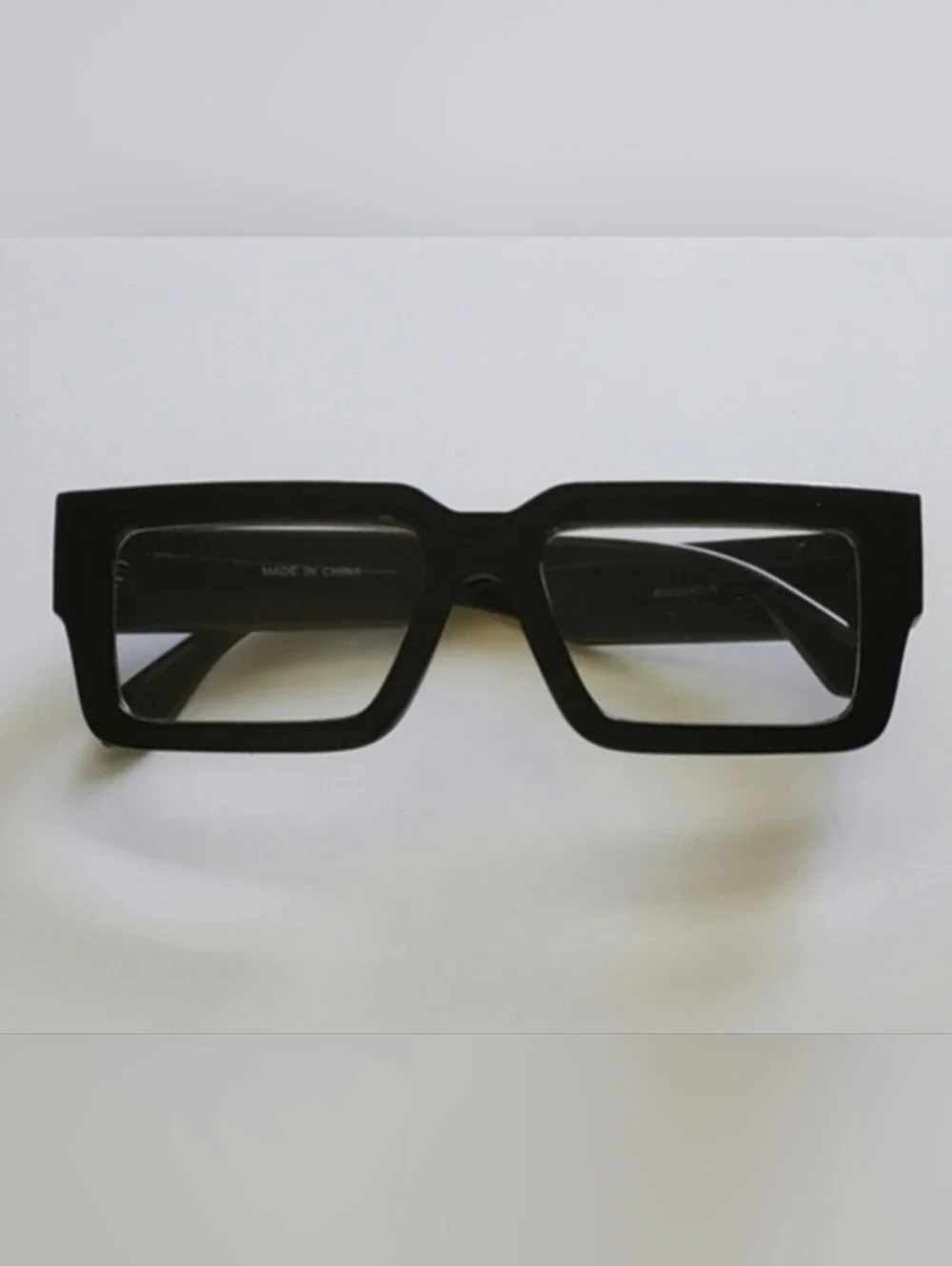 Black Glasses with Gold Accents